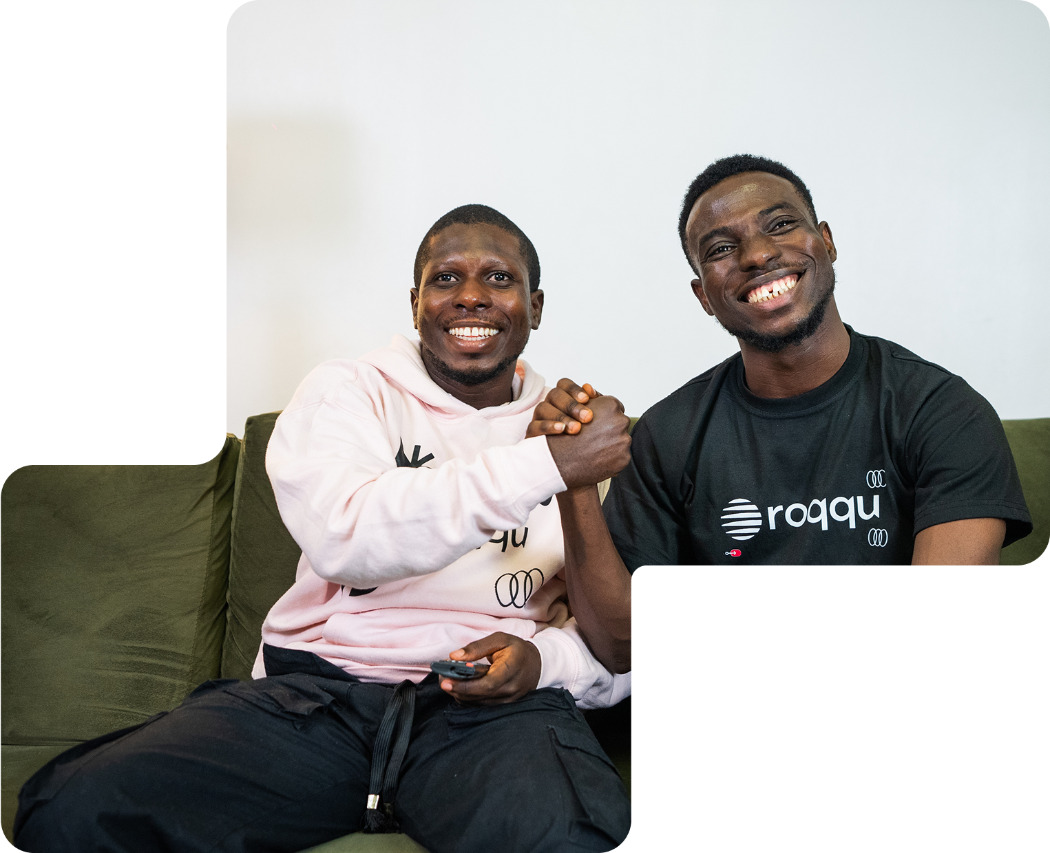 An image of two vibarant men smiling